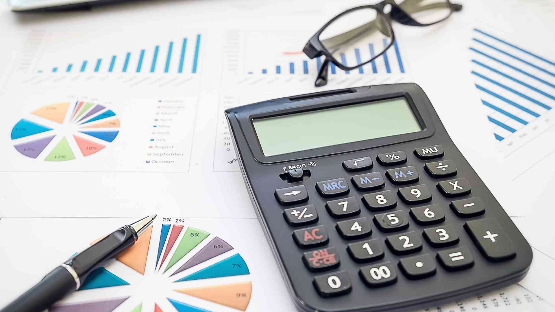 documents and calculator to determine the budget for hiring a VA